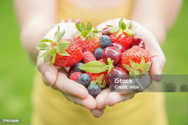 Girl Holding Fruits Stock Photo - Download Image Now - Fruit, Heart Shape, Holding