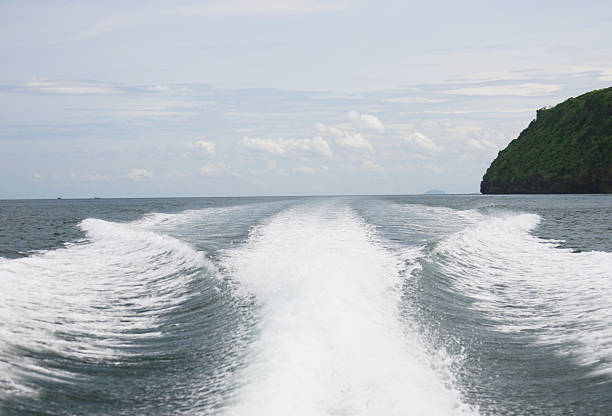 wave from engineboat on the way toTarutao wave from engineboat on the way toTarutao National Marine Park of thaliand tarutao stock pictures, royalty-free photos & images