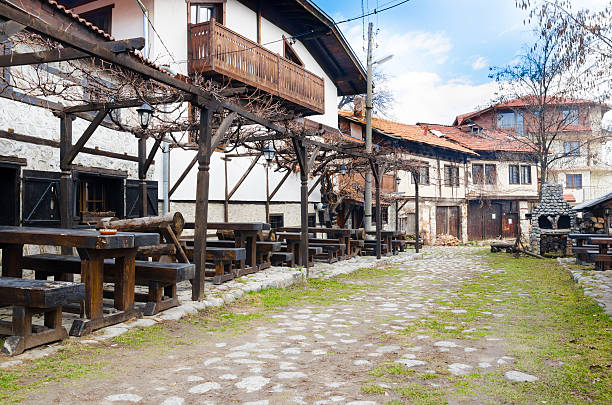 istock old architecture houses and stone paved road, Bansko, Bulgaria 179014578
