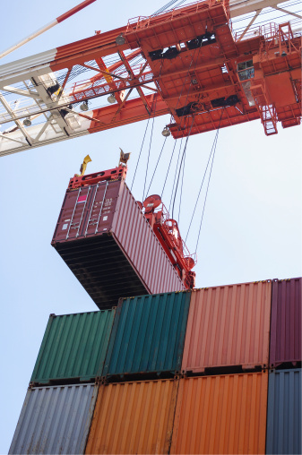 container cargo operation by shore crane