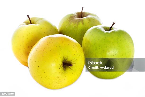 Four Fresh Yellow Green Apples Isolated On A White Background Stock Photo - Download Image Now