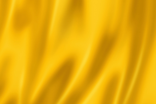 Yellow satin, silk, texture background
