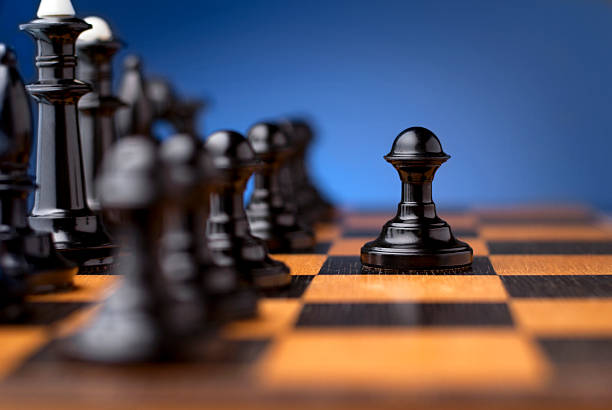 istock group of black chess on a chessboard 179016914