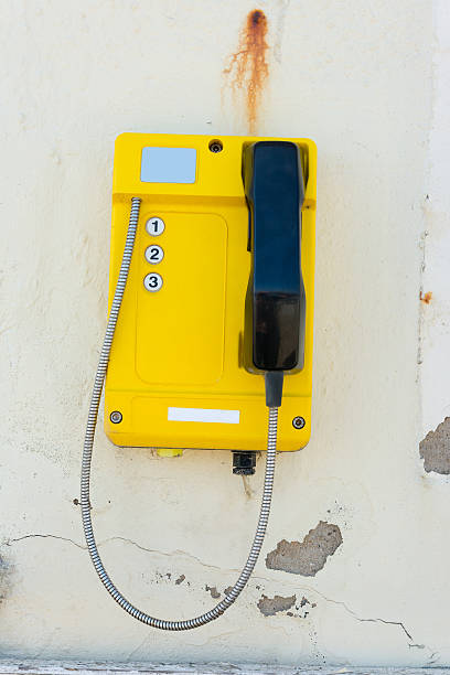 istock Telephone set mounted on a dilapidated wall 179017347