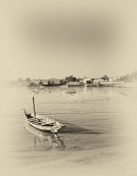 istock Wrecked boat at receding shore 179018293