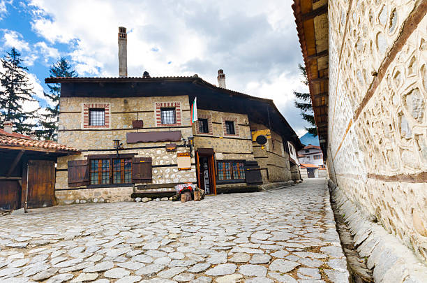 istock old architecture houses and stone paved road, Bansko, Bulgaria 179018351