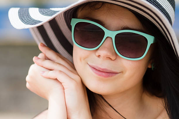 istock Young brunette in turqoise sunglasses 179019164