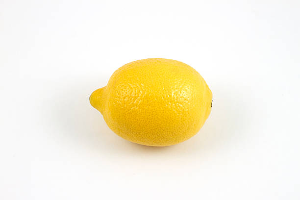 Yellow Lemon on White Background stock photo