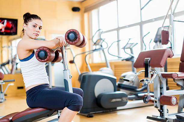 istock Young woman in the gym 179020285