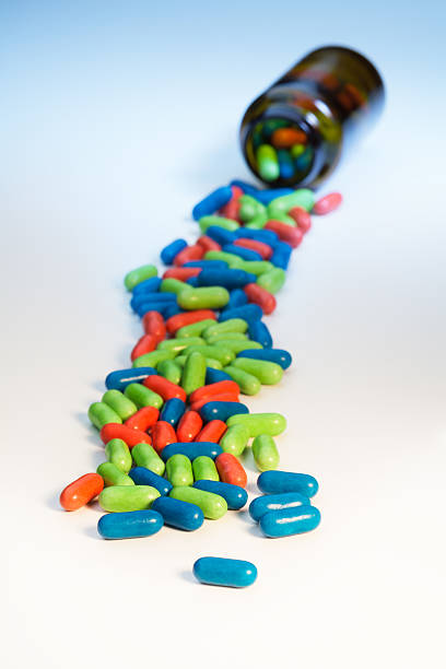 istock Jar and color pills 179020513