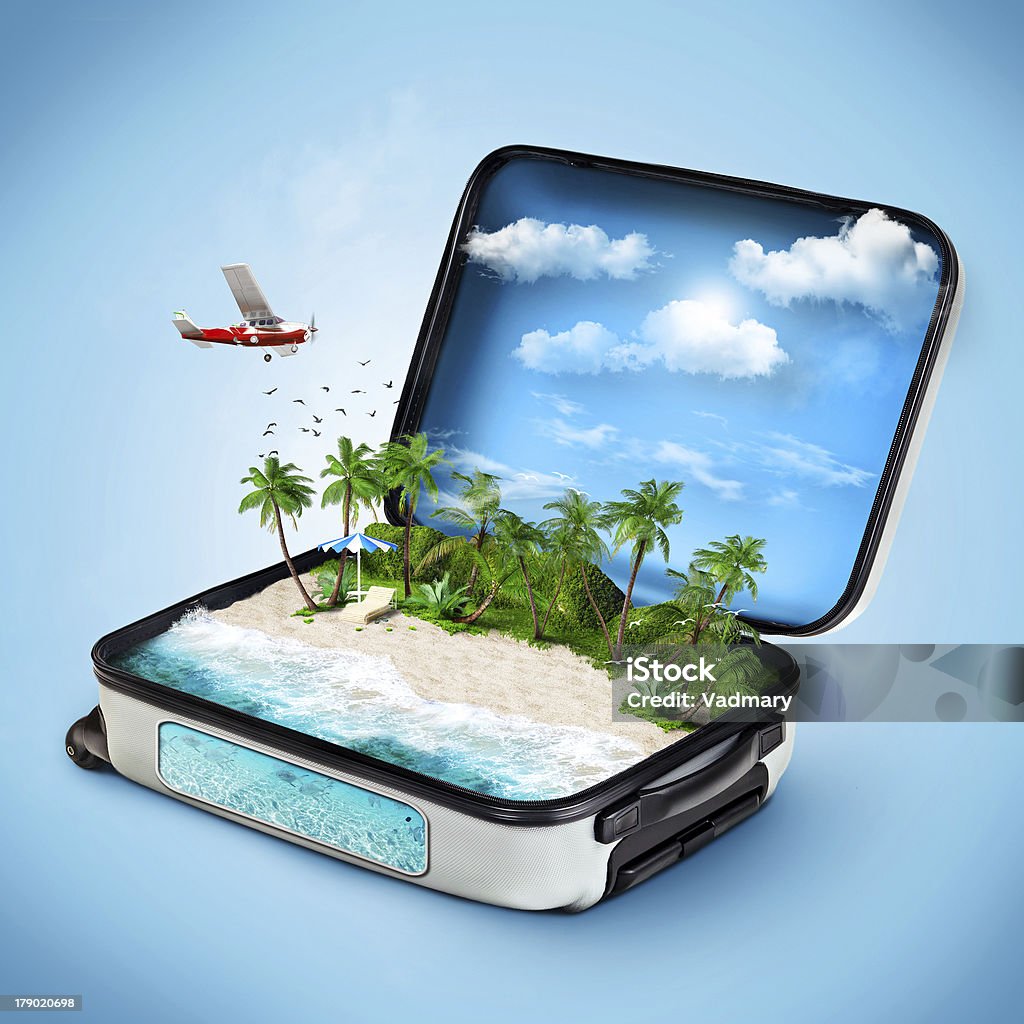 Traveling Open suitcase with a tropical island inside. Traveling Open Stock Photo