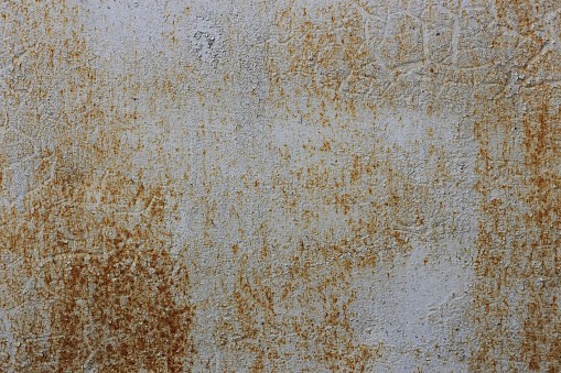 Corroded metal board. Grunge rusty orange brown metal