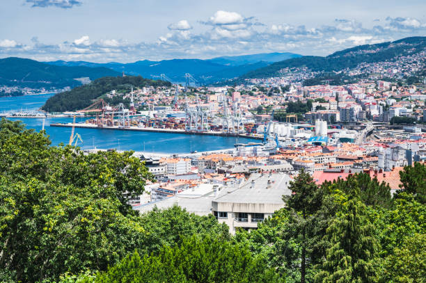 The view from the hill in Parque Monte del Castro, park located on a hill in Vigo, the biggest city in Galicia Region, in the North of Spain. View of the sea, houses and trees, selective focus