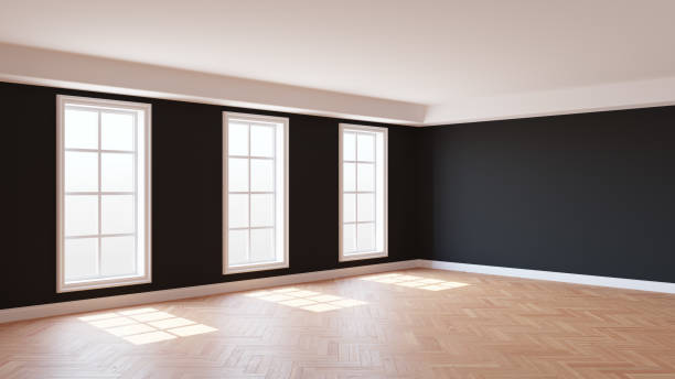 istock Sunny Interior with Black Walls, Three Large Windows, White Ceiling and Cornice 1790219508