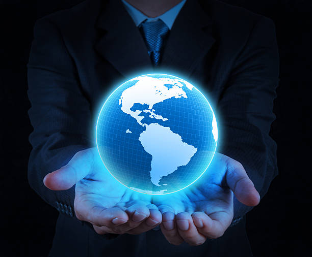 istock holding a glowing earth globe in his hands 179022474