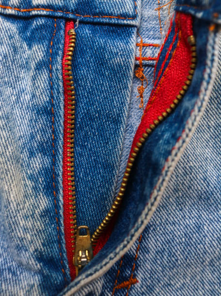 istock Blue Jean pants with gold zipper. select focus. background and texture. 1790231447