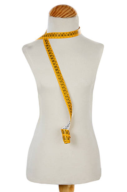 istock Mannequin with a tape measure 179023282