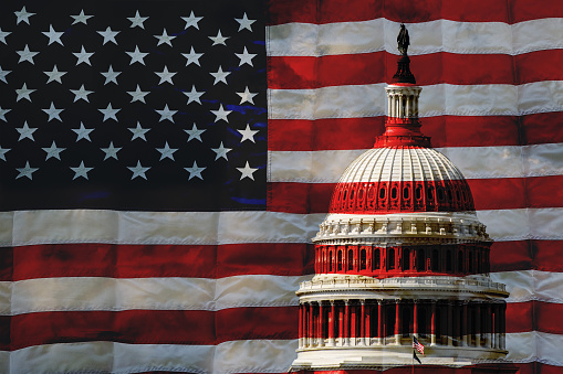 close up view of the american flag waving in the wind. Selective focus. Democracy, independence and election day. Patriotic symbol of American pride. Selective focus