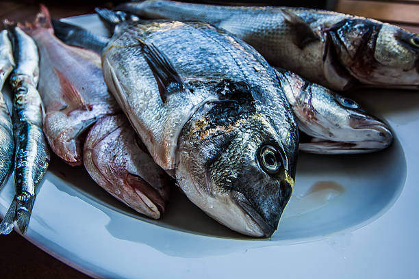 Fish on plate stock photo