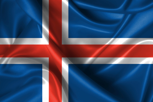 Realistic wavy flag of Iceland.