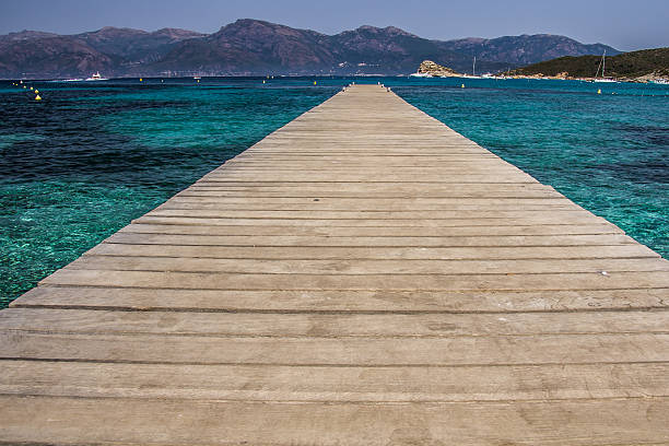 Wooden pier, corsica stock photo