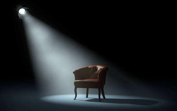 chair on stage stage spotlight chair stock pictures, royalty-free photos & images