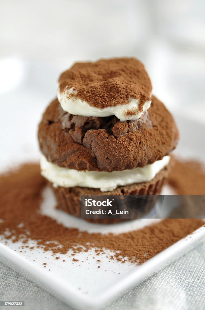 Chocolate Cupcake with raspberries Baked Pastry Item Stock Photo