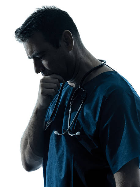istock doctor man silhouette portrait thinking 179027383