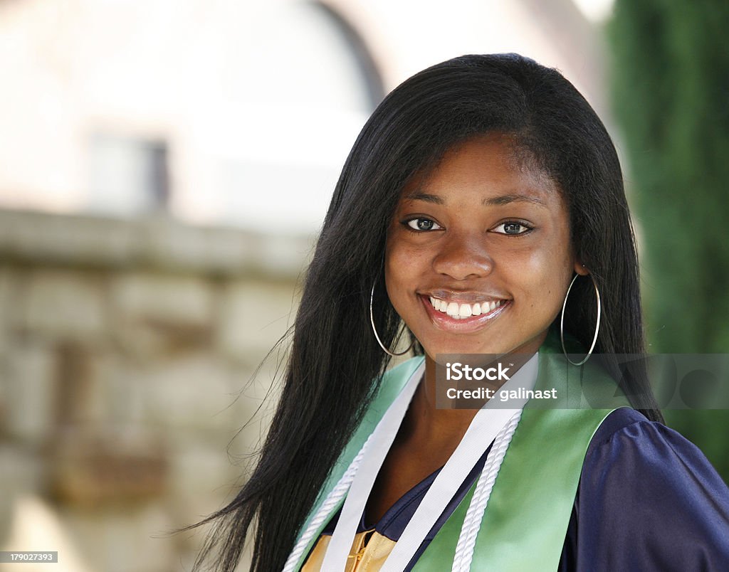 Graduate Beautiful African-American high school graduate Graduation Stock Photo