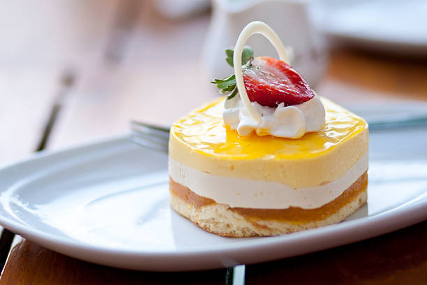 istock Tropical Mango Passion Fruit Mousse with strawberry in the toppi 179027689