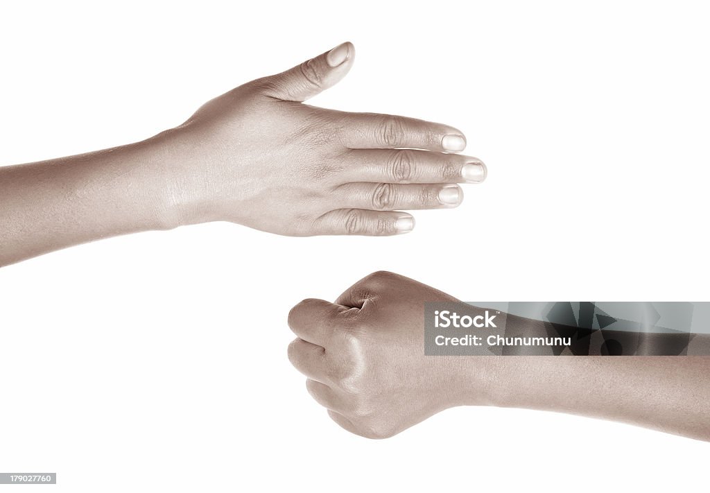 paper winning against rock Rock Paper Scissors with paper wining against rock Rock Paper Scissors Stock Photo