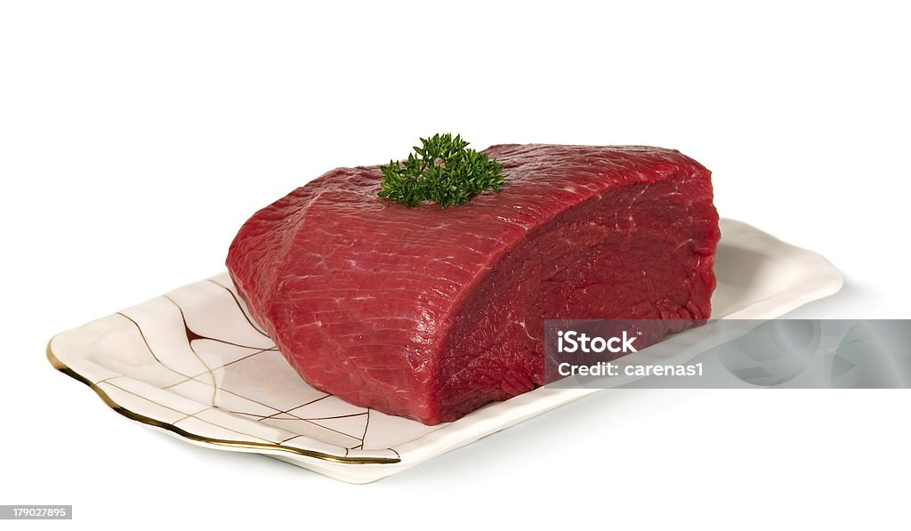 Raw sliced meat on plate Raw sliced meat placed on plate, food concept Animal Muscle Stock Photo