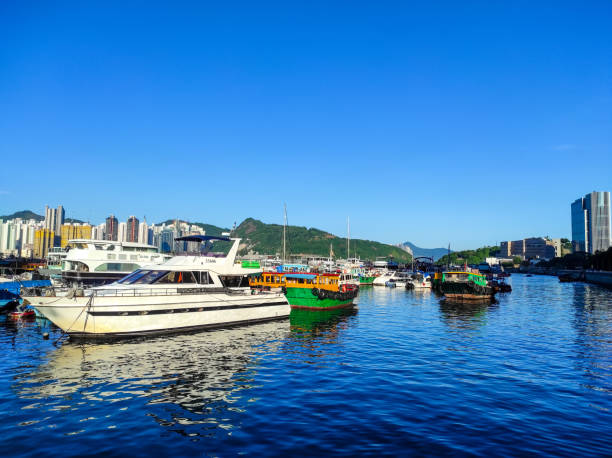 Hong Kong, November 05,2023 : Ships dock at the Shau Kei Wan typhoon shelter harbor area, Hong Kong.