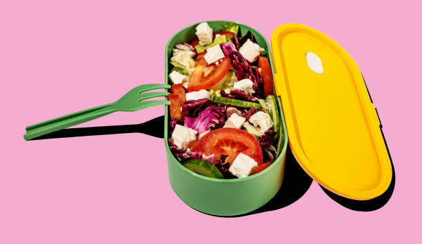 istock Healthy vegetable salad in lunch box, fork 1790297152