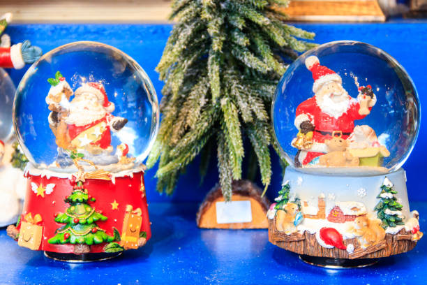 istock Two beautiful snow globes with Santa inside 1790297704