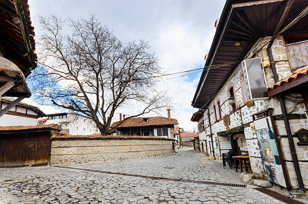 istock old architecture houses and stone paved road, Bansko, Bulgaria 179031230