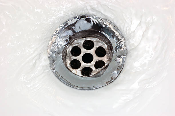 istock Basin Drain Running Water Macro Closeup 179031580