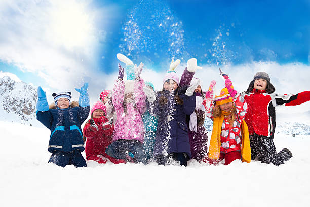 istock Group of happy kids throwing snow 179031973