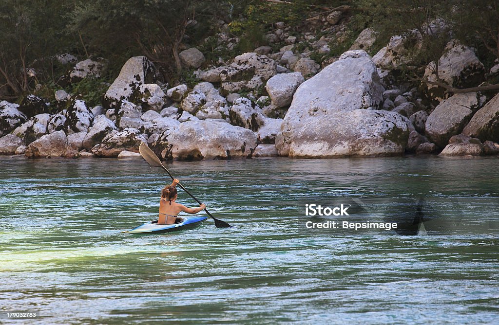 Kayaking on the Soca river, Slovenia Kayaking in the summer on the Soca river, Slovenia Activity Stock Photo