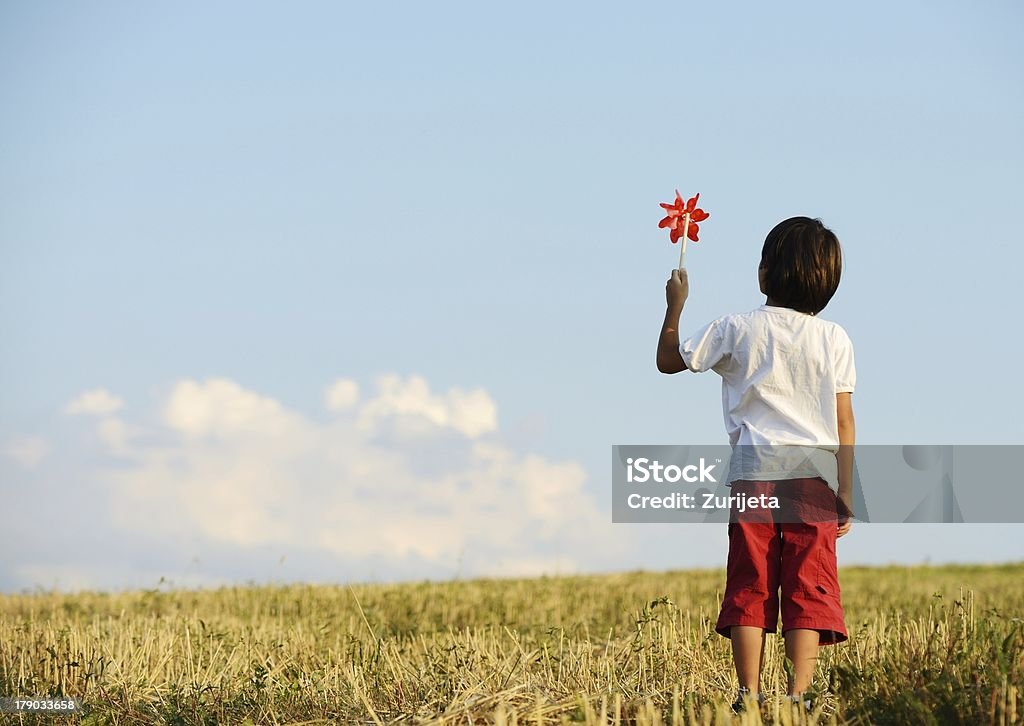 Child in nature Kid on field Activity Stock Photo