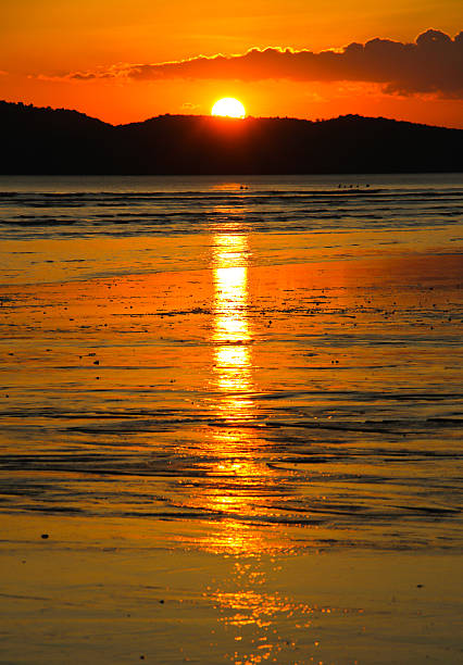 istock golden sunset beach 179034380