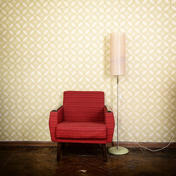Vintage room with old fashioned armchair stock photo