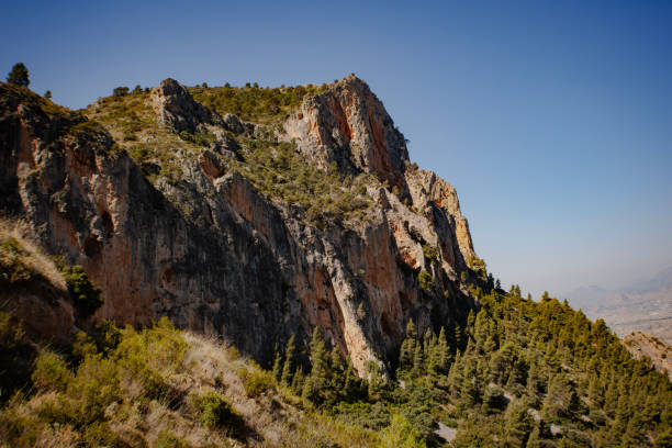 Views of  the side of the Cabeçó d'Or mountain from the halfway stock photo