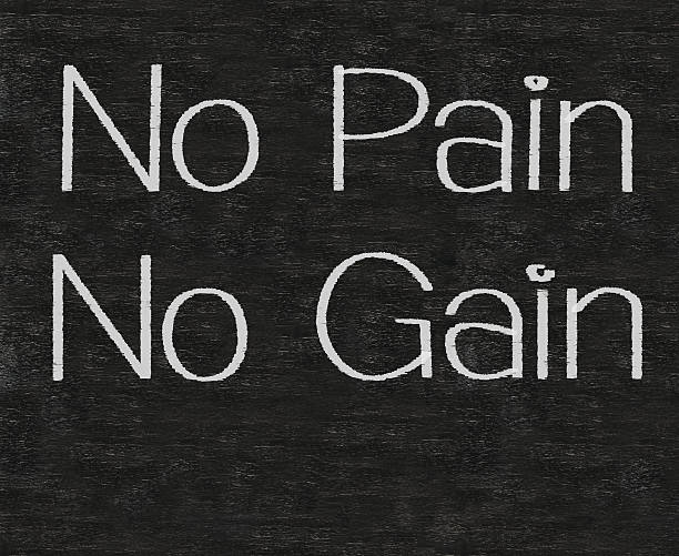 istock no pain, gain on blackboard background 179036697