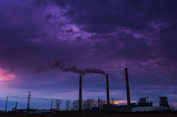 istock Heavy smoke spewed from coal powered plant 179037349