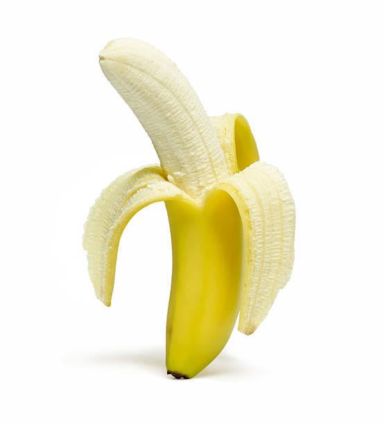 istock peeled banana standing straight, isolated on white 179037578