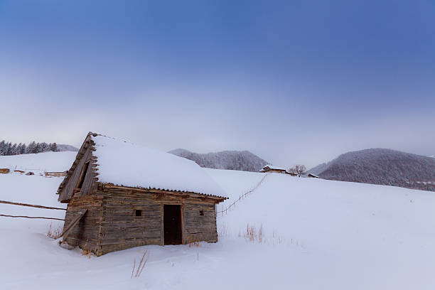 istock Old cottage in winter 179038226