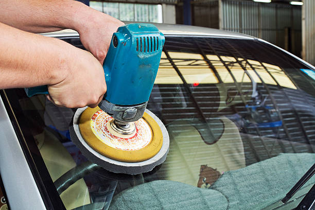 istock Car Glass polishing with power buffer machine 179038543