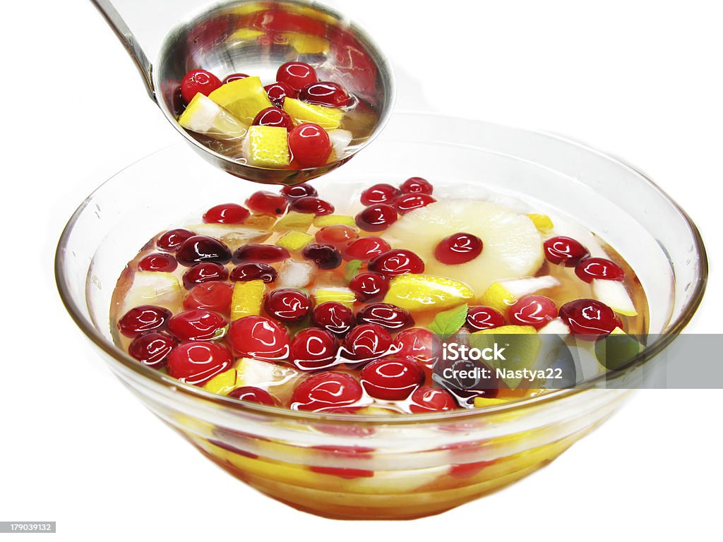punch cocktail drink with fruit fruit cruchon cocktail punch in bowl with ice and fruit Alcohol Abuse Stock Photo