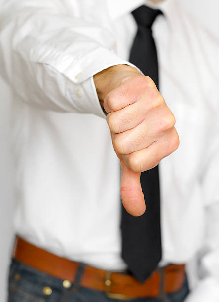 istock Businessman with thumbs down 179041574